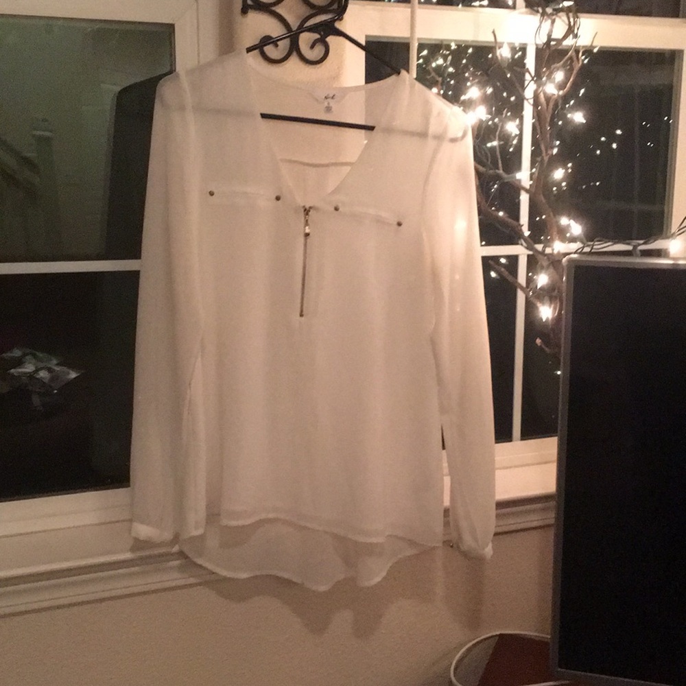 Sophisticated and classy sheer white blouse!